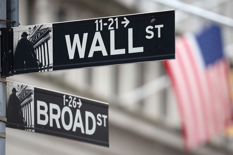 Wall Street ends lower, oil dips as Fed looms