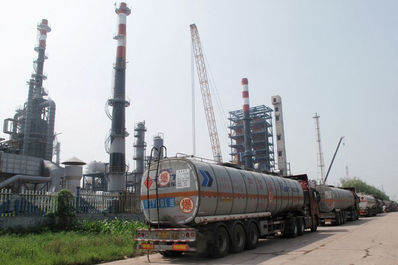 China 'teapot' refiners halt plants as new fuel tax bites, sources say